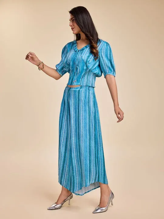printed puff sleeve, ruffled  tie-up v neck corset top with smocking at the back with a comfortable flared pants set in viscose satin - Blue