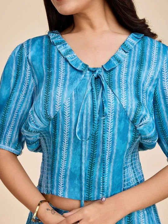 printed puff sleeve, ruffled  tie-up v neck corset top with smocking at the back with a comfortable flared pants set in viscose satin - Blue